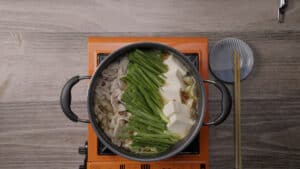 Pot with nira, tofu, cabbage, and tofu